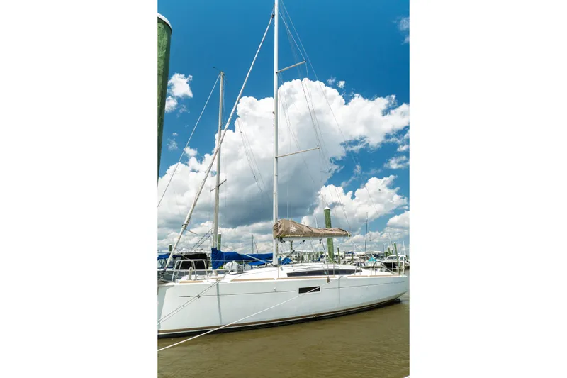 Slide: The Image of Interior of 2018 Jeanneau Sun Odyssey 349 yacht with modern kitchen and stairs. - 13