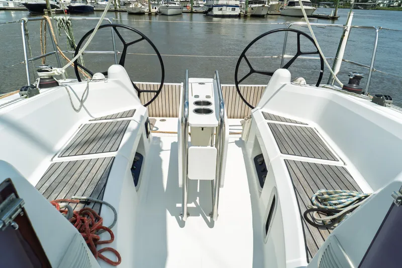 Slide: The Image of 2018 Jeanneau Sun Odyssey 349 yacht kitchen with sink, stove, and microwave. - 17