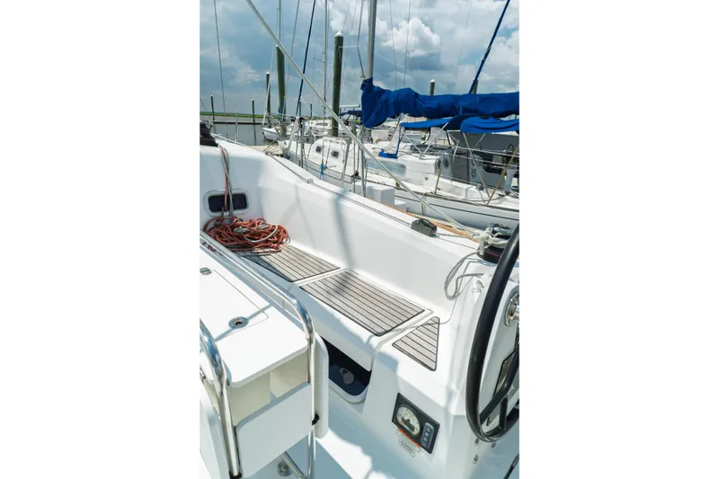 Slide: The Image of Compact kitchen and cozy sleeping area in 2018 Jeanneau Sun Odyssey 349 sailboat. - 20