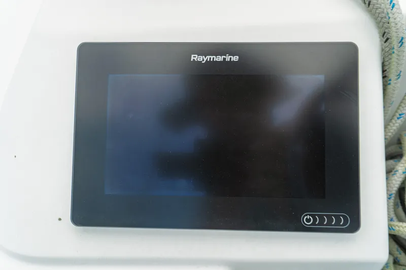 Slide: The Image of Cabin interior of 2018 Jeanneau Sun Odyssey 349 with bed and wooden cabinetry. - 23