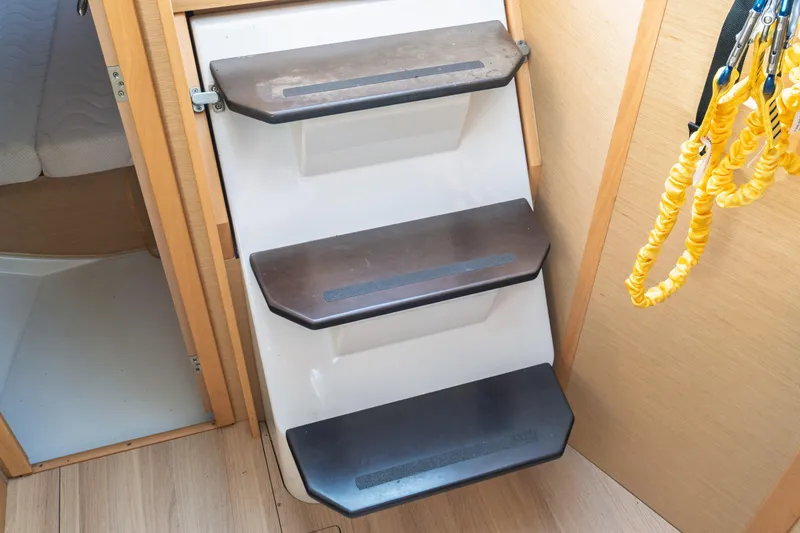 Slide: The Image of Interior of 2018 Jeanneau Sun Odyssey 349 yacht, featuring a compact bathroom with sink. - 36