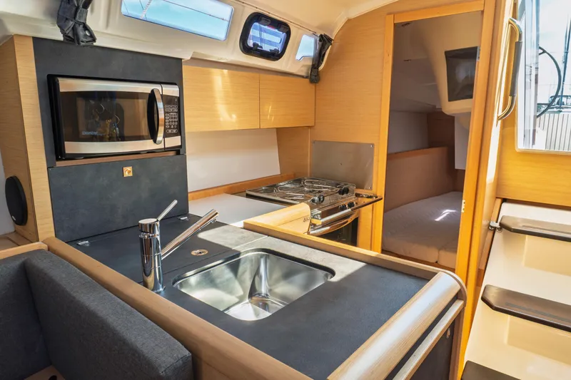 Slide: The Image of Manufacturer Provided Image: 2018 Jeanneau Sun Odyssey 349 interior layout with cabins, kitchen, and seating area. - 44