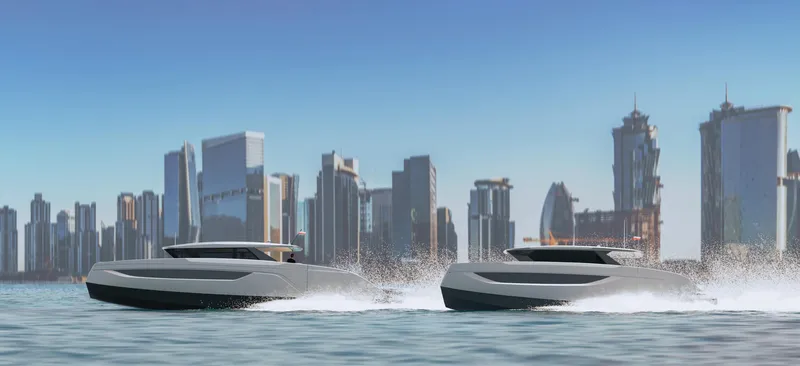 Slide: The Image of Two Sunreef 44 Ultima yachts cruising near a modern city skyline, 2026 model. - 7