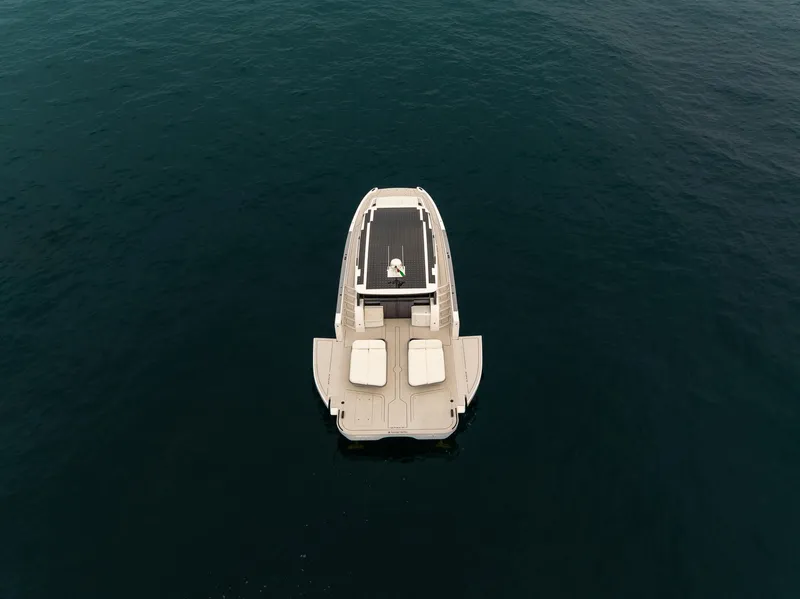 Slide: The Image of Aerial view of 2026 Sunreef 55 Ultima yacht on calm ocean waters. - 13