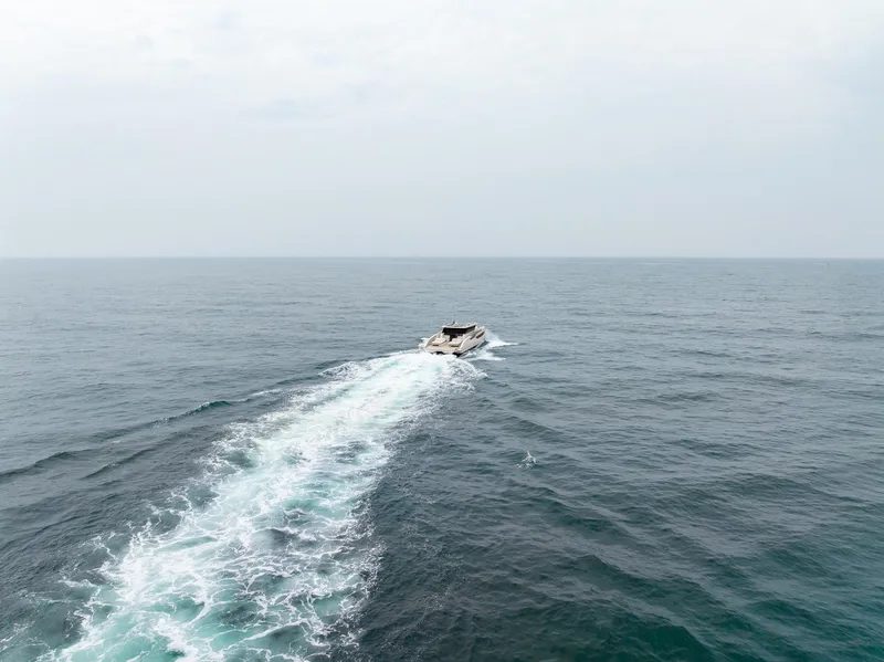 Slide: The Image of Sunreef 55 Ultima yacht cruising on open sea, 2026 model. - 14