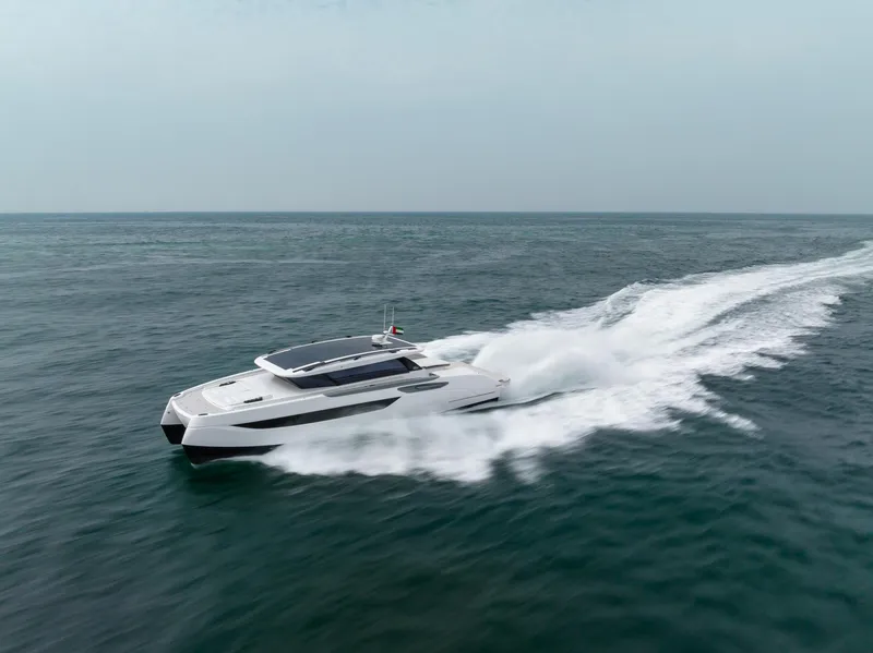 Slide: The Image of 2026 Sunreef 55 Ultima yacht cruising swiftly on open sea. - 17