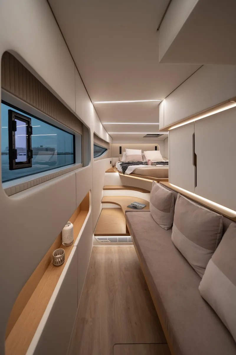 Slide: The Image of Luxurious interior of 2026 Sunreef 55 Ultima yacht with modern design and cozy seating. - 9