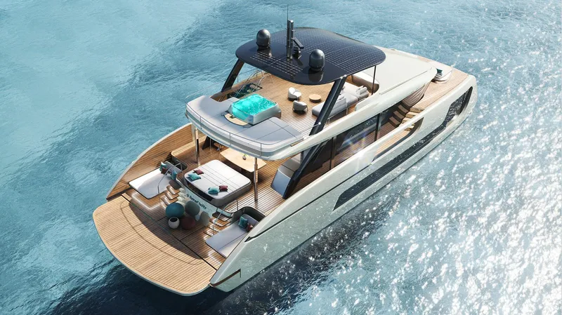 Slide: The Image of Luxury Sunreef 77 Ultima yacht cruising on clear blue waters, 2026 model. - 14