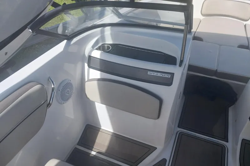 Slide: The Image of 2017 Bayliner VR5 Bowrider OB interior with seating and cup holder. - 5