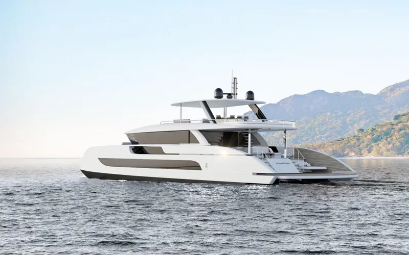 Slide: The Image of Luxury Sunreef 88 Ultima yacht cruising near scenic coastline, 2026 model. - 9