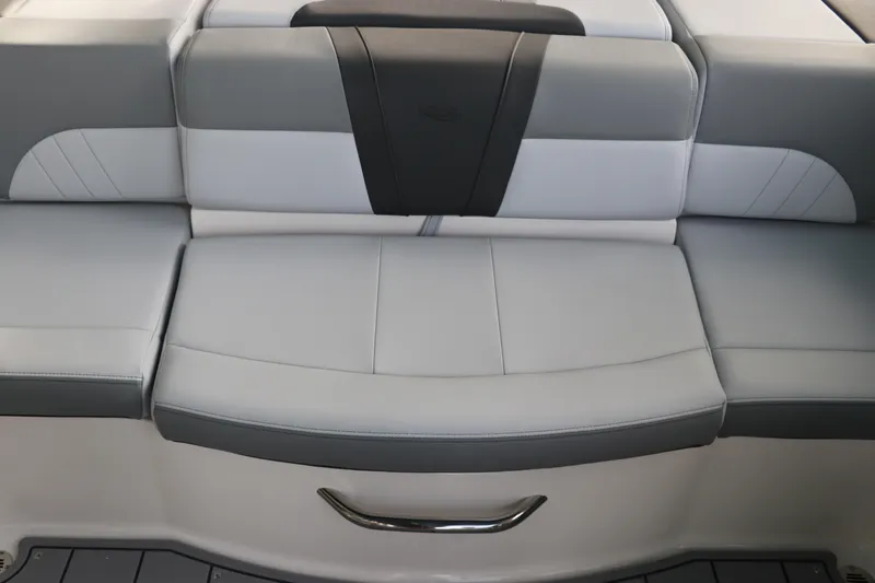 Slide: The Image of 2026 Chaparral 21 SSi OB boat seat, featuring sleek gray and black upholstery. - 18