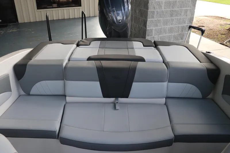 Slide: The Image of 2026 Chaparral 21 SSi OB boat interior with gray and black seating. - 9