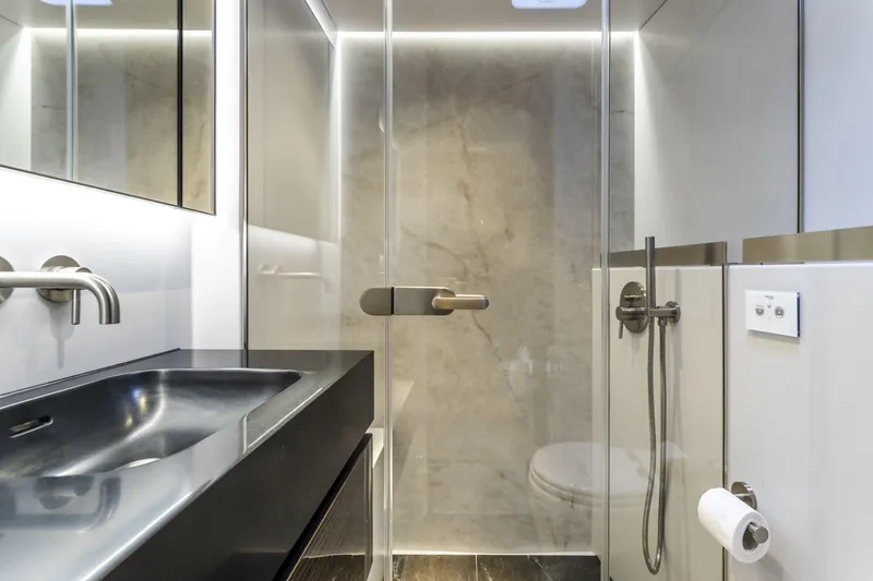 Slide: The Image of Luxurious bathroom in 2022 Sunreef 70 NAOMA yacht, featuring sleek design and modern fixtures. - 12