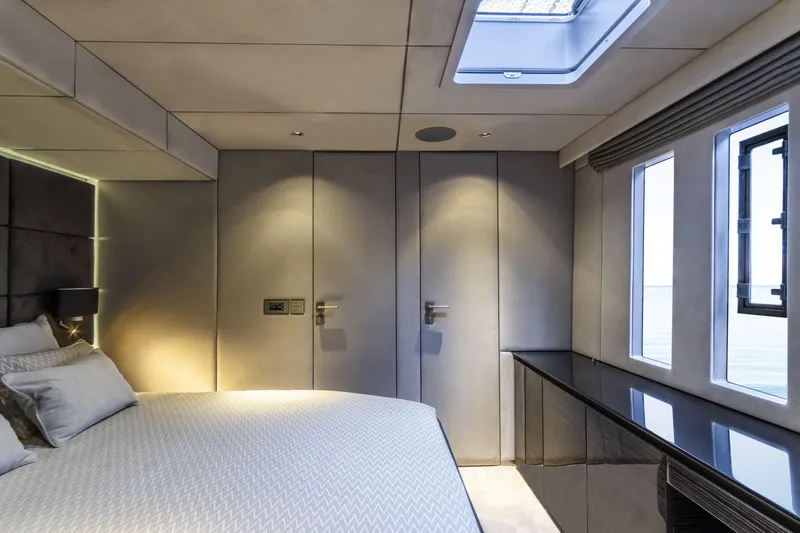 Slide: The Image of Luxurious bedroom interior of 2022 Sunreef 70 NAOMA yacht with modern design and natural light. - 14