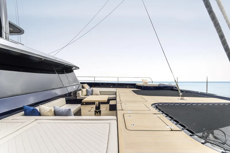 Slide: The Image of Luxurious Sunreef 70 NAOMA yacht deck with seating area, 2022 model. - 9