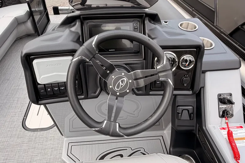 Slide: The Image of 2026 Veranda VR 235 RC boat dashboard with steering wheel and control panel. - 14