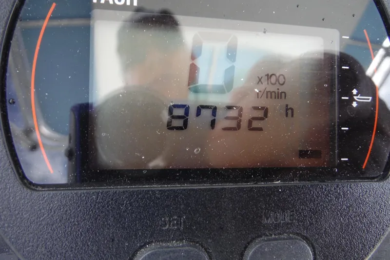 Slide: The Image of Close-up of a Sailfish 2660 CC 2008 tachometer displaying 8732 hours. - 19
