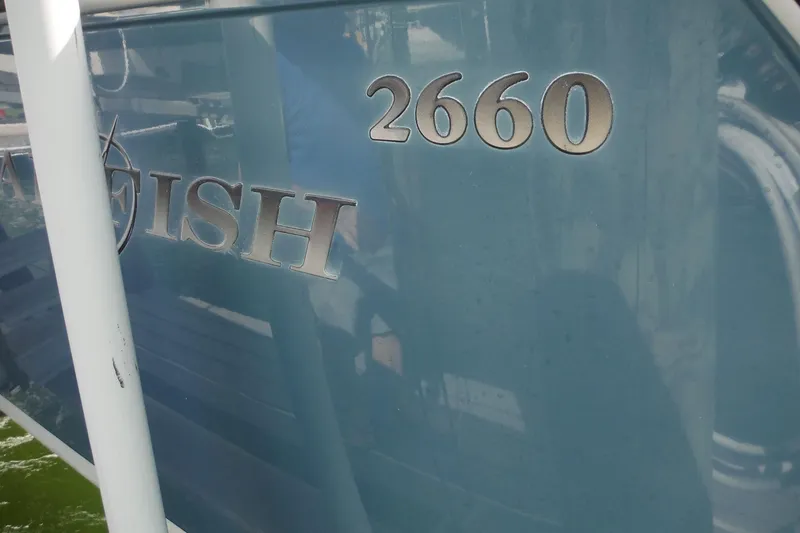 Slide: The Image of 2008 Sailfish 2660 CC boat with partial logo and model number visible. - 48