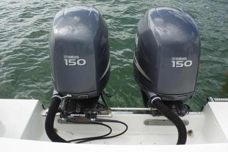 Slide: The Image of Twin Yamaha 150 outboard motors on a 2008 Sailfish 2660 CC boat. - 7