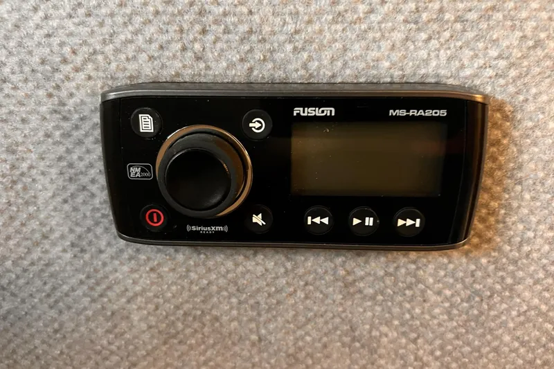 Slide: The Image of Fusion MS-RA205 marine stereo on 1989 Shamrock 260 Hardtop boat interior. - 23