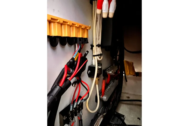 Slide: The Image of Electrical wiring inside a 1989 Shamrock 260 Hardtop boat. - 25