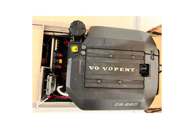 Slide: The Image of 1989 Shamrock 260 Hardtop engine compartment with Volvo Penta D3-220 engine. - 28