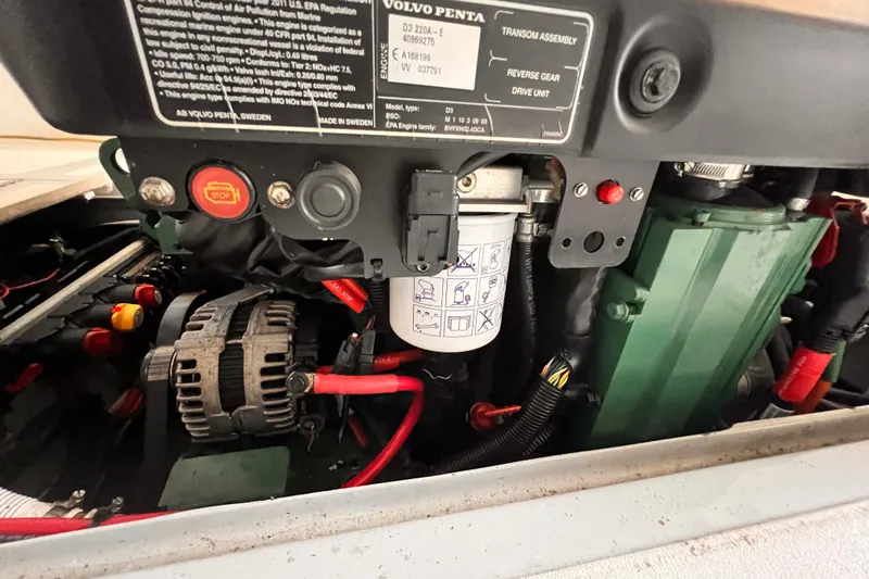 Slide: The Image of Engine compartment of a 1989 Shamrock 260 Hardtop with Volvo Penta components. - 29