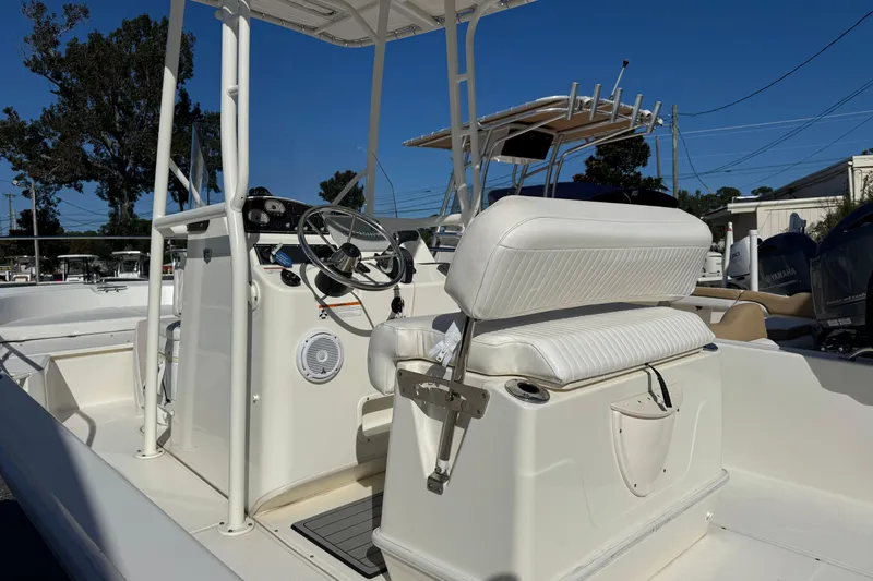 Slide: The Image of 2018 Boston Whaler 210 Montauk boat interior with steering console and seating. - 29
