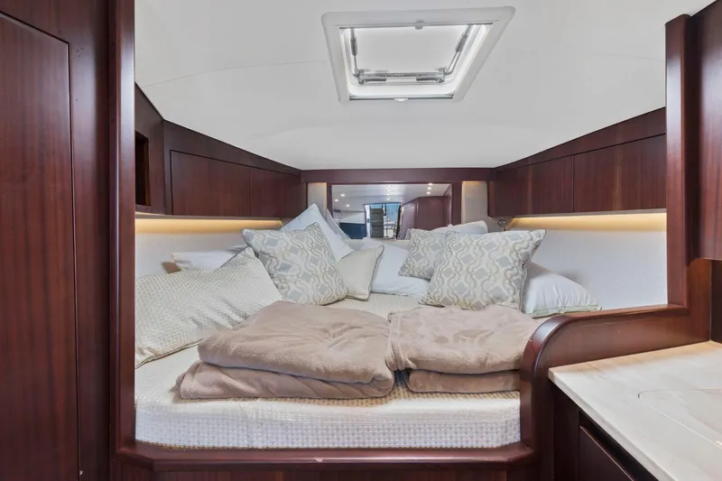 Slide: The Image of Luxurious cabin interior of 2017 Jupiter 41SB yacht with cozy bedding. - 15
