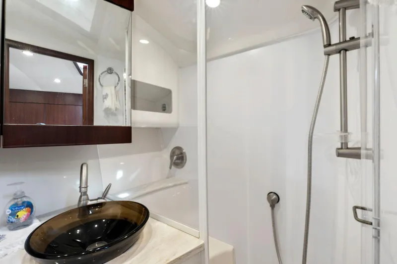 Slide: The Image of 2017 Jupiter 41SB yacht bathroom with modern sink and shower. - 19