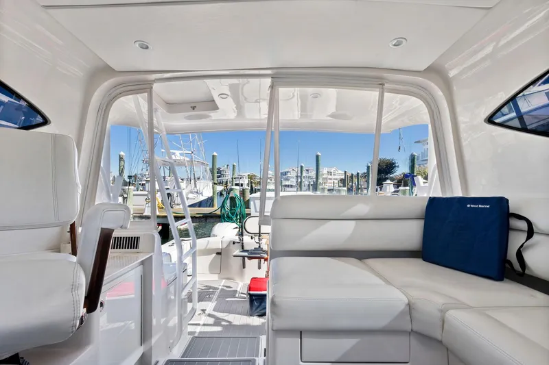 Slide: The Image of Interior of 2017 Jupiter 41SB boat with marina view. - 7