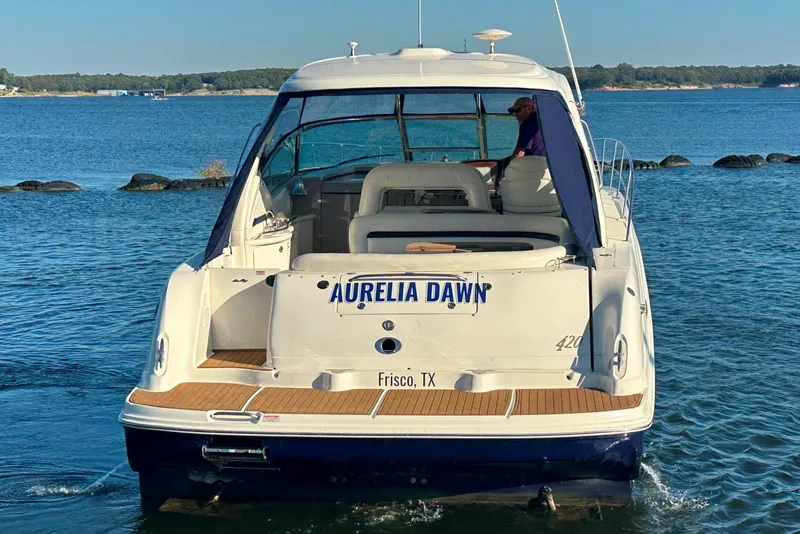 Slide: The Image of 2004 Sea Ray 420 Sundancer boat named "Aurelia Dawn" on the water in Frisco, TX. - 13
