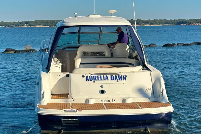 Slide: The Image of 2004 Sea Ray 420 Sundancer boat named "Aurelia Dawn" on water, Frisco, TX. - 14