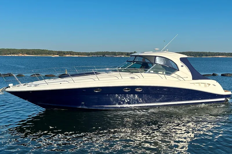 Slide: The Image of 2004 Sea Ray 420 Sundancer yacht cruising on a sunny day. - 2