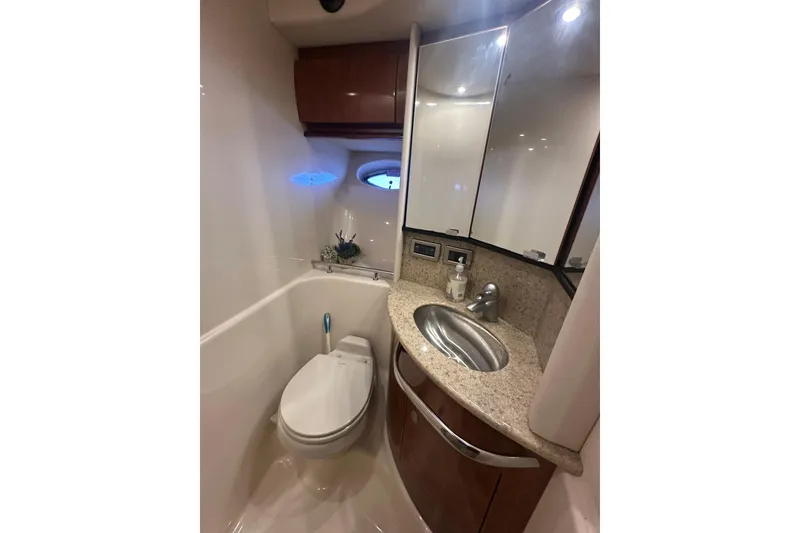 Slide: The Image of Luxurious bathroom in 2004 Sea Ray 420 Sundancer yacht with modern fixtures. - 65