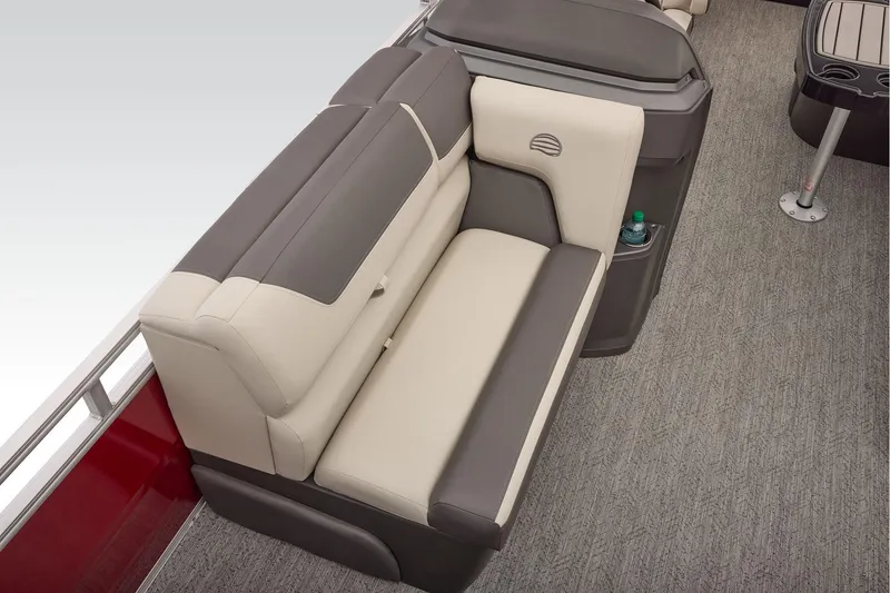 Slide: The Image of Manufacturer Provided Image: 2026 Sun Tracker Fishin' Barge 22 DLX interior seating with cup holder and carpeted floor. - 52