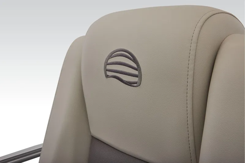 Slide: The Image of Manufacturer Provided Image: 2026 Sun Tracker Fishin' Barge 22 DLX seat with embroidered logo detail. - 65