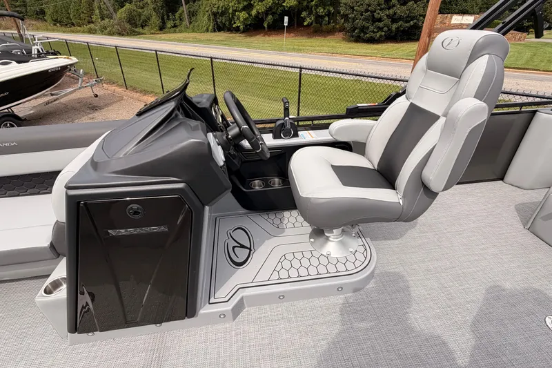 Slide: The Image of 2026 Veranda VR 265 VLI boat helm with sleek captain's chair and modern dashboard. - 13