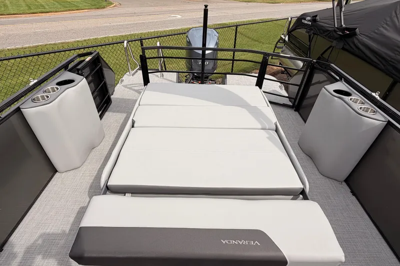 Slide: The Image of 2026 Veranda VR 265 VLI pontoon boat with spacious seating and cup holders. - 18