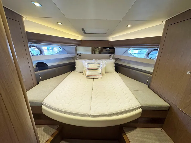 Slide: The Image of Luxurious cabin interior of 2015 Beneteau Gran Turismo 44 yacht with cozy bedding. - 7