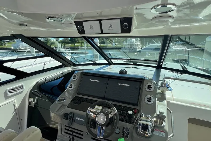 Slide: The Image of Aerial view of 2013 Sea Ray 540 Sundancer yacht cruising on water. - 14