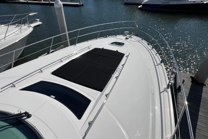 Slide: The Image of Luxurious bedroom interior of 2013 Sea Ray 540 Sundancer yacht with elegant bedding. - 15