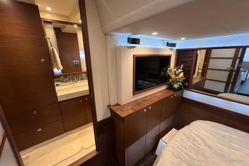 Slide: The Image of Luxurious bedroom interior of 2013 Sea Ray 540 Sundancer yacht with elegant decor. - 21