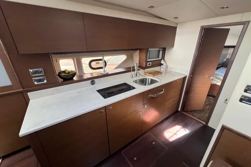 Slide: The Image of Luxurious bathroom in 2013 Sea Ray 540 Sundancer yacht with modern shower fixtures. - 26