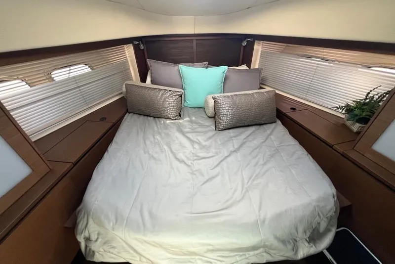 Slide: The Image of Luxurious bathroom interior of 2013 Sea Ray 540 Sundancer yacht, featuring modern fixtures and elegant design. - 29