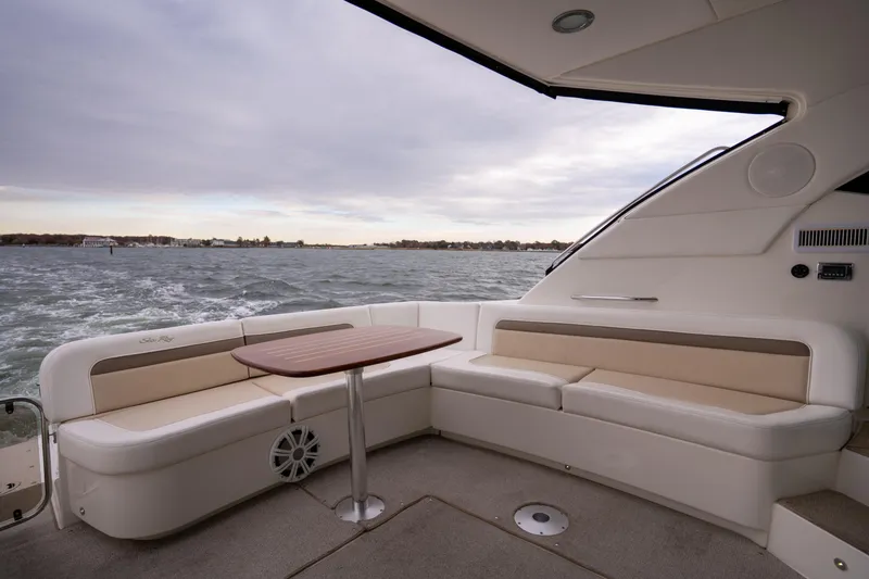 Slide: The Image of Luxurious 2013 Sea Ray 540 Sundancer yacht interior with elegant seating and ocean view. - 37