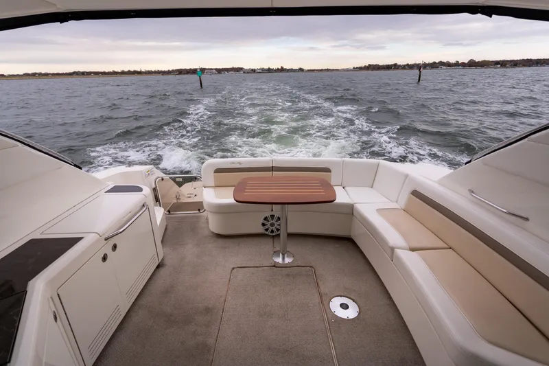 Slide: The Image of Luxury 2013 Sea Ray 540 Sundancer yacht interior with ocean view and seating area. - 39