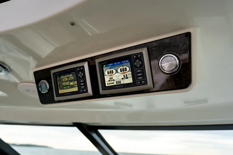 Slide: The Image of Control panel of 2013 Sea Ray 540 Sundancer yacht with digital displays. - 43