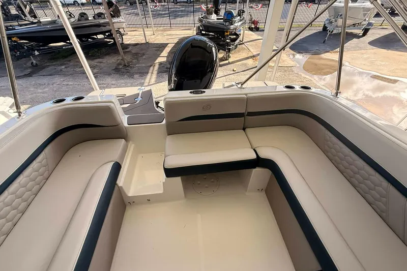 Slide: The Image of 2026 Hurricane Sundeck Sport 218 OB boat interior with spacious seating and modern design. - 13