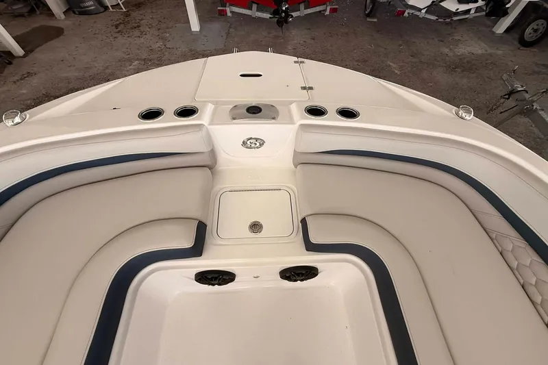 Slide: The Image of Bow seating area of 2026 Hurricane Sundeck Sport 218 OB boat, featuring cushioned seats. - 4